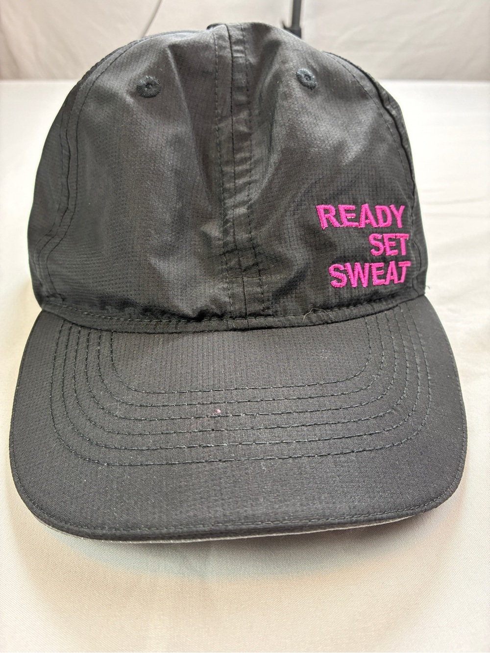 Ladies Headsweats Black Baseball Cap with Pink "READY SET SWEAT" Embroidery